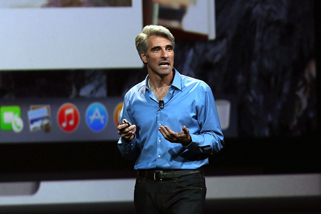 SAN FRANCISCO, CA - JUNE 02:  Apple Senior Vice President of Software Engineering Craig Federighi speaks during the Apple Worldwide Developers Conference at the Moscone West center on June 2, 2014 in San Francisco, California. Tim Cook kicked off the annual WWDC which is typically a showcase for upcoming updates to Apple hardware and software. The conference runs through June 6.  (Photo by Justin Sullivan/Getty Images)
